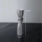 Striped Polyresin Candle Holder with Twisted Knot Accent